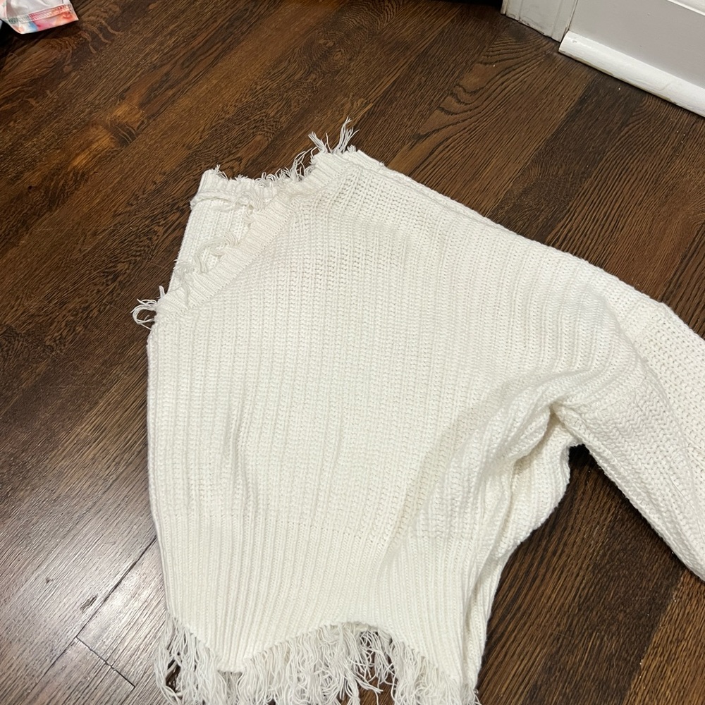distressed white sweater